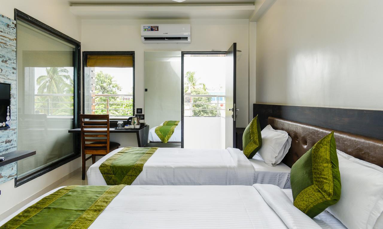Treebo Malhaar Regency Hotel Chinchvad Екстериор снимка