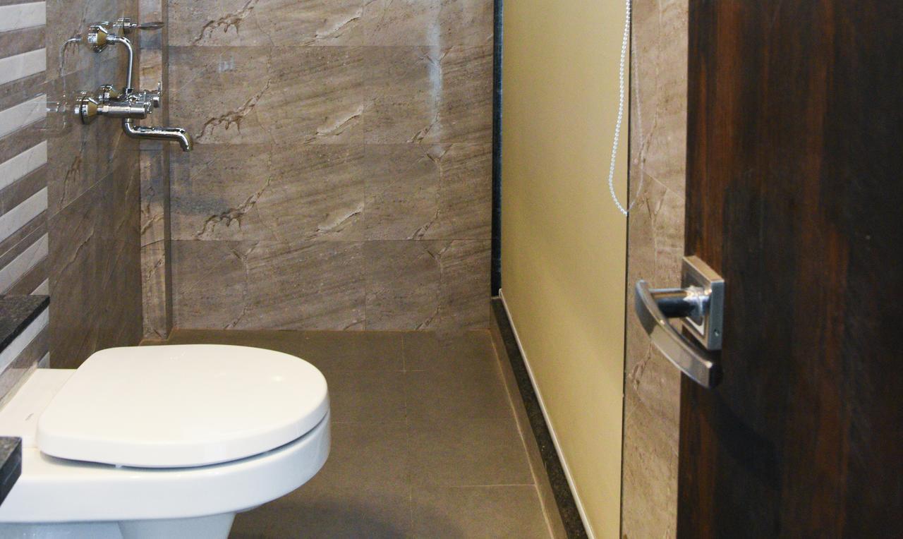 Treebo Malhaar Regency Hotel Chinchvad Екстериор снимка