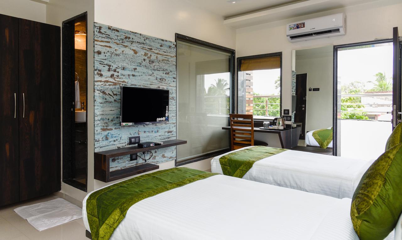 Treebo Malhaar Regency Hotel Chinchvad Екстериор снимка