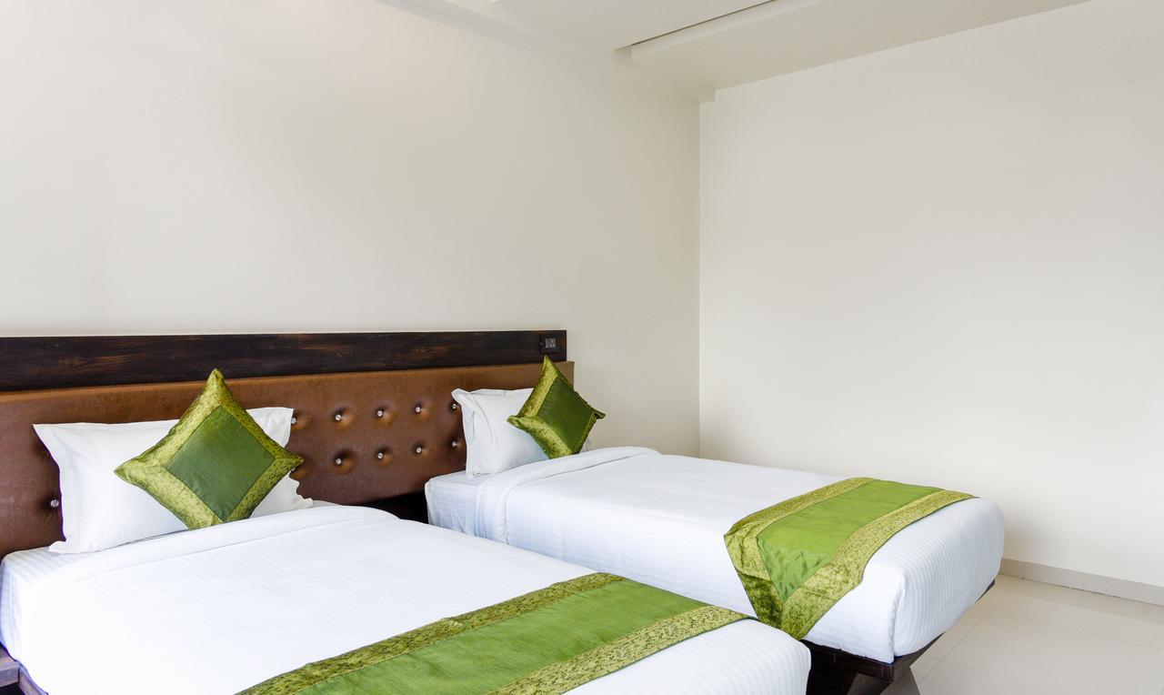 Treebo Malhaar Regency Hotel Chinchvad Екстериор снимка